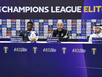 Felix Sanchez Bas, Head Coach of Al Sadd FC, and player Meshal Barsham attend a press conference at Jassim Bin Hamad Stadium in Doha, Qatar,...