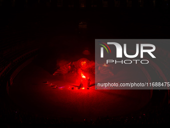 A Zoolians artist captivates the audience with a fiery performance during the closing show of '????????'?????: Arcanes' in the Arles arenas....