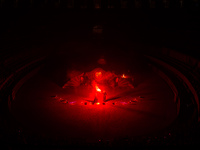 A Zoolians artist captivates the audience with a fiery performance during the closing show of '????????'?????: Arcanes' in the Arles arenas....