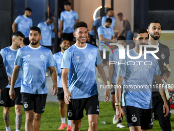 Players of Al Sadd SC stand before the training session at Jassim Bin Hamad Stadium in Doha, Qatar, on October 20, 2024, ahead of the AFC Ch...