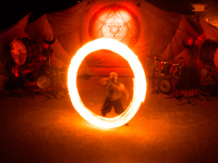 A Zoolians artist captivates the audience with a fiery performance during the closing show of '????????'?????: Arcanes' in the Arles arenas....