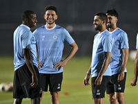 Players of Al Sadd SC attend a training session at Jassim Bin Hamad Stadium in Doha, Qatar, on October 20, 2024, ahead of the AFC Champions...