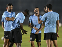 Players of Al Sadd SC attend a training session at Jassim Bin Hamad Stadium in Doha, Qatar, on October 20, 2024, ahead of the AFC Champions...