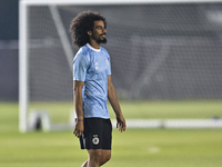 Akram Hassan Afif of Al Sadd FC participates in the training session at Jassim Bin Hamad Stadium in Doha, Qatar, on October 20, 2024, ahead...