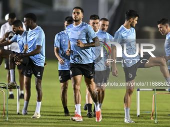 Players of Al Sadd SC attend a training session at Jassim Bin Hamad Stadium in Doha, Qatar, on October 20, 2024, ahead of the AFC Champions...