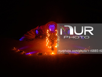 A Zoolians artist captivates the audience with a fiery performance during the closing show of '????????'?????: Arcanes' in the Arles arenas....