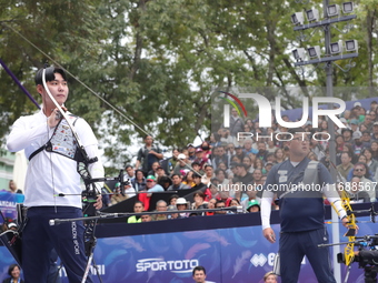 Kim Woojin of Korea and Lee Woo Seok of Korea compete during the Men's recurve final match on the final day of the Tlaxcala 2024 Archery Wor...