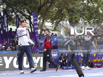 Kim Woojin of Korea and Lee Woo Seok of Korea compete during the Men's recurve final match on the final day of the Tlaxcala 2024 Archery Wor...