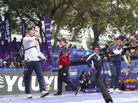 Kim Woojin of Korea and Lee Woo Seok of Korea compete during the Men's recurve final match on the final day of the Tlaxcala 2024 Archery Wor...