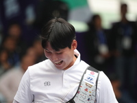 Lee Woo Seok of Korea competes against Kim Woojin of Korea (not in picture) during the Men's recurve final match on the final day of the Tla...