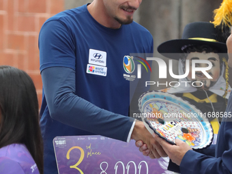 Bronze medalist Marcus D'Almeida of Brazil receives the third-place prize during the medal ceremony on the final day of the Tlaxcala 2024 Ar...