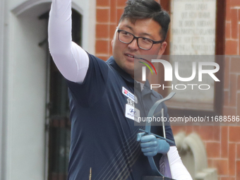 Gold medalist winner Kim Woojin of Korea receives the first place prize during the medal ceremony on the final day of the Tlaxcala 2024 Arch...