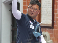 Gold medalist winner Kim Woojin of Korea receives the first place prize during the medal ceremony on the final day of the Tlaxcala 2024 Arch...