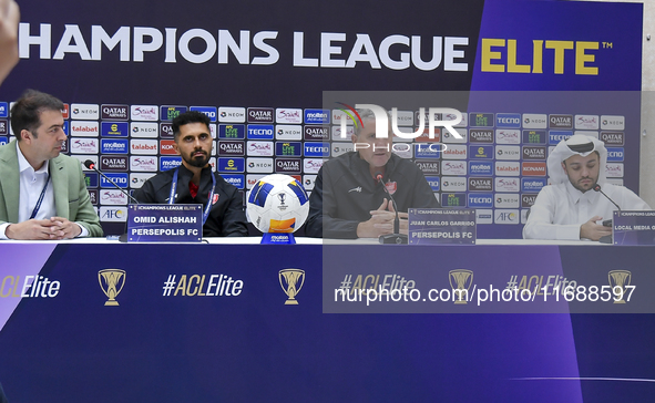 Head Coach of Persepolis FC Juan Carlos Fernandez (second from right) and player Omid Alishah (second from left) attend the press conference...