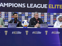 Head Coach of Persepolis FC Juan Carlos Fernandez (second from right) and player Omid Alishah (second from left) attend the press conference...