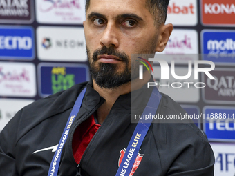 Persepolis FC player Omid Alishah attends a press conference at Jassim Bin Hamad Stadium in Doha, Qatar, on October 20, 2024, ahead of the A...