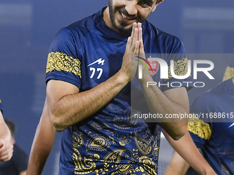 Mohammad Khodabandehlo of Persepolis FC reacts during the training session at Jassim Bin Hamad Stadium in Doha, Qatar, on October 20, 2024,...