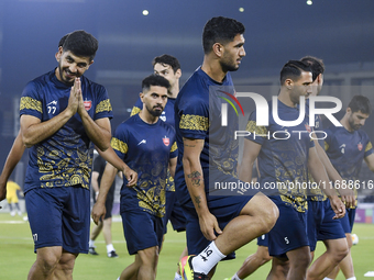 Persepolis FC players attend a training session at Jassim Bin Hamad Stadium in Doha, Qatar, on October 20, 2024, ahead of the AFC Champions...