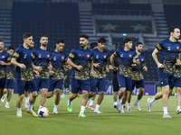 Persepolis FC players attend a training session at Jassim Bin Hamad Stadium in Doha, Qatar, on October 20, 2024, ahead of the AFC Champions...