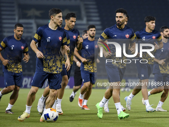 Persepolis FC players attend a training session at Jassim Bin Hamad Stadium in Doha, Qatar, on October 20, 2024, ahead of the AFC Champions...