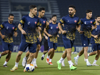 Persepolis FC players attend a training session at Jassim Bin Hamad Stadium in Doha, Qatar, on October 20, 2024, ahead of the AFC Champions...