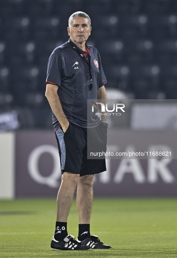 Head coach of Persepolis FC, Juan Carlos Fernandez, looks on during a training session at Jassim Bin Hamad Stadium in Doha, Qatar, on Octobe...