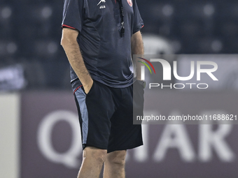 Head coach of Persepolis FC, Juan Carlos Fernandez, looks on during a training session at Jassim Bin Hamad Stadium in Doha, Qatar, on Octobe...