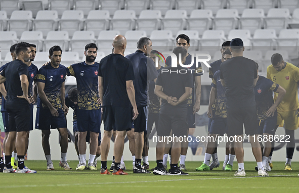 Persepolis FC head coach Juan Carlos Fernandez and players participate in the training session at Jassim Bin Hamad Stadium in Doha, Qatar, o...