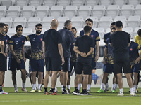 Persepolis FC head coach Juan Carlos Fernandez and players participate in the training session at Jassim Bin Hamad Stadium in Doha, Qatar, o...