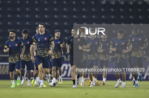 Persepolis FC players attend a training session at Jassim Bin Hamad Stadium in Doha, Qatar, on October 20, 2024, ahead of the AFC Champions...