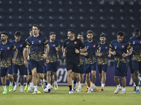 Persepolis FC players attend a training session at Jassim Bin Hamad Stadium in Doha, Qatar, on October 20, 2024, ahead of the AFC Champions...