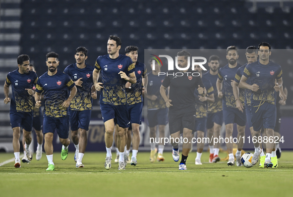 Persepolis FC players attend a training session at Jassim Bin Hamad Stadium in Doha, Qatar, on October 20, 2024, ahead of the AFC Champions...