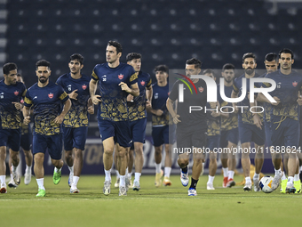 Persepolis FC players attend a training session at Jassim Bin Hamad Stadium in Doha, Qatar, on October 20, 2024, ahead of the AFC Champions...