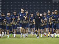 Persepolis FC players attend a training session at Jassim Bin Hamad Stadium in Doha, Qatar, on October 20, 2024, ahead of the AFC Champions...