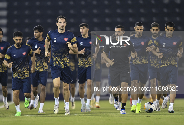 Persepolis FC players attend a training session at Jassim Bin Hamad Stadium in Doha, Qatar, on October 20, 2024, ahead of the AFC Champions...