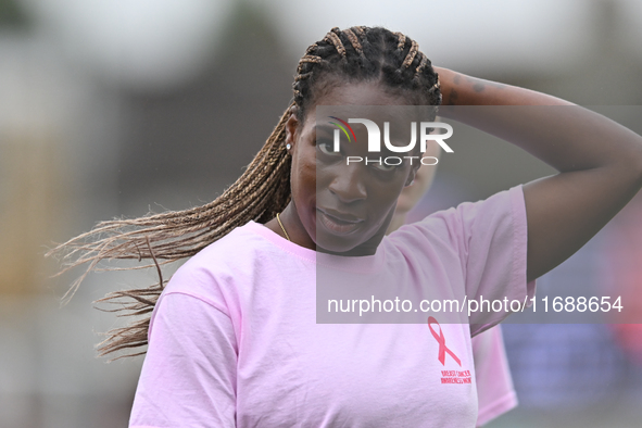 Viviane Assey of West Ham United warms up during the Barclays FA Women's Super League match between West Ham United and Arsenal at the Chigw...