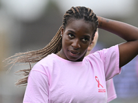 Viviane Assey of West Ham United warms up during the Barclays FA Women's Super League match between West Ham United and Arsenal at the Chigw...