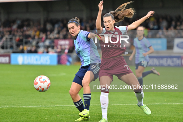 Mariona Caldentey (8 Arsenal) and Seraina Piubel (77 West Ham) battle for the ball during the Barclays FA Women's Super League match between...