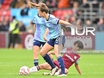 Lia Walti (13 Arsenal) is challenged by Riko Ueki (9 West Ham) during the Barclays FA Women's Super League match between West Ham United and...