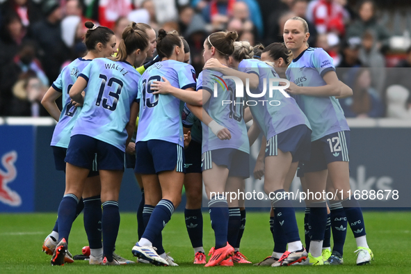 The Arsenal team huddles during the Barclays FA Women's Super League match between West Ham United and Arsenal at the Chigwell Construction...