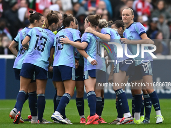 The Arsenal team huddles during the Barclays FA Women's Super League match between West Ham United and Arsenal at the Chigwell Construction...