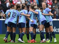 The Arsenal team huddles during the Barclays FA Women's Super League match between West Ham United and Arsenal at the Chigwell Construction...