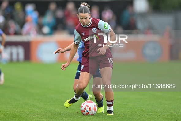 Anouk Denton, 18, of West Ham, controls the ball during the Barclays FA Women's Super League match between West Ham United and Arsenal at th...