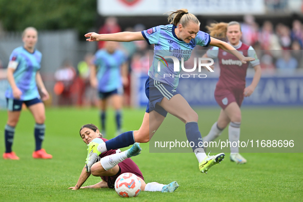 Frida Maanum (12 Arsenal) is challenged by Katrina Gorry (22 West Ham) during the Barclays FA Women's Super League match between West Ham Un...