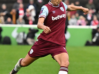 Riko Ueki (9 West Ham) crosses the ball during the Barclays FA Women's Super League match between West Ham United and Arsenal at the Chigwel...