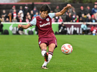 Riko Ueki (9 West Ham) crosses the ball during the Barclays FA Women's Super League match between West Ham United and Arsenal at the Chigwel...