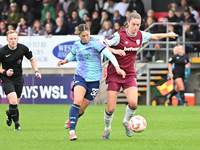 Kyra Cooney Cross (32 Arsenal) and Emma Harris (12 West Ham) challenge for the ball during the Barclays FA Women's Super League match betwee...