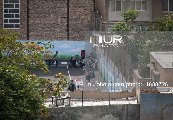 Iranian students appear at a high school in the historical city of Tabriz, Iran, on October 16, 2024, amid global concerns about war between...