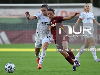 Monica Renzotti of A.C. Milan Femminile and Lucia Di Guglielmo of A.S. Roma Femminile are in action during the 7th day of the Serie A Femmin...