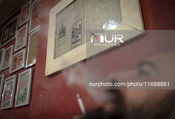 An Iranian man smokes a cigarette at a cafe at night in the historical city of Tabriz, Iran, located 624 km (388 miles) northwest of Tehran...